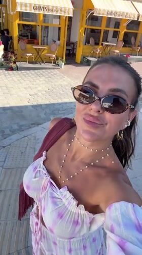 Woman takes selfies at CHIVES bakery in Bodrum Turkey