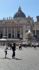Crowds gather in St. Peter's Square on sunny Friday afternoon