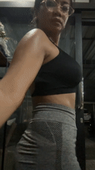 Woman records gym selfie in Batubulan, Indonesia