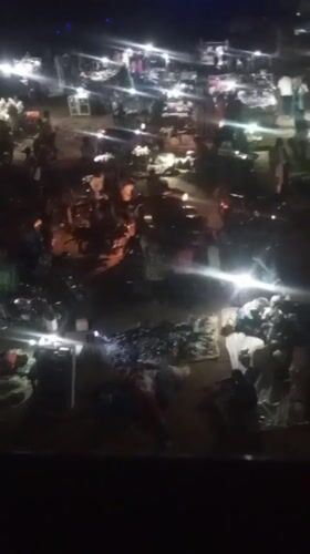 Evening markets busy with shoppers in Nigerian neighborhoods