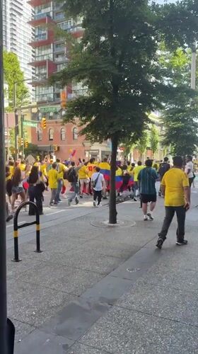 Colombian soccer fans march through downtown Vancouver