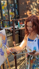 Painter, streets, and sidewalk life in Tel Aviv