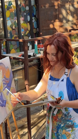 Painter, streets, and sidewalk life in Tel Aviv