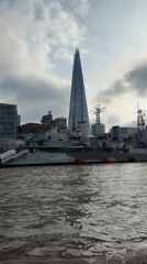 Thames riverfront landmarks Tower Bridge and Shard captured from water