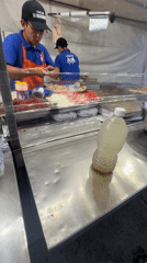 Late-night taco vendor serves customers in Mexico City