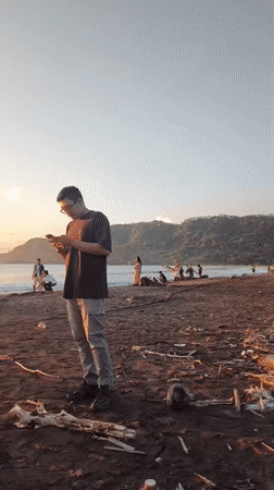 Sunset beach gathering draws photographers in Ciwaru, Indonesia