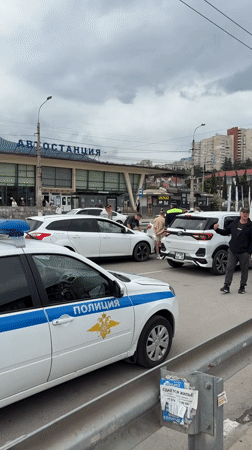 Daily life scenes documented across Alushta including traffic accident