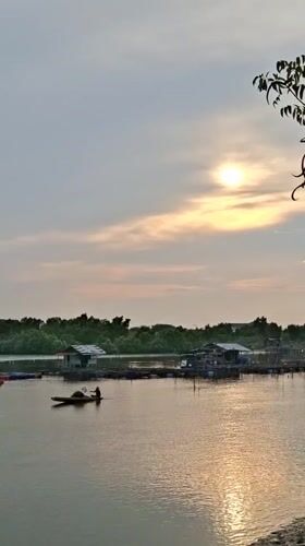 Daily life on Lhokseumawe's floating fish farms and waterways