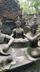 Traditional Thai stone statues captured in Ko Samui garden