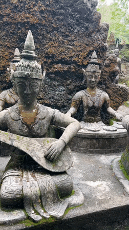 Traditional Thai stone statues captured in Ko Samui garden