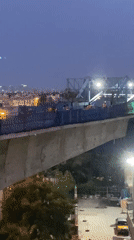 Chennai's St. Thomas Mount metro and streets at dusk