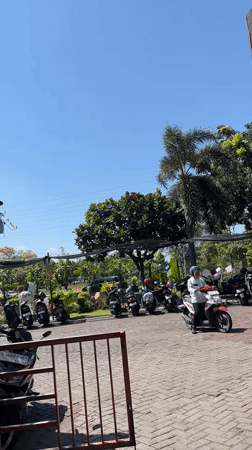 Everyday street and park life in Pagerwojo on a sunny morning