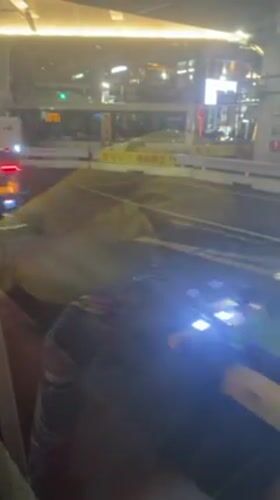 Construction vehicle spotted in cordoned zone on Shibuya street
