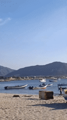 Evening scenes captured in Juan Griego: beach boats, town square