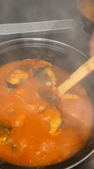 Home cooking session captured in Kazan, fish stew preparation