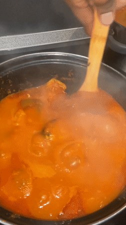 Home cooking session captured in Kazan, fish stew preparation