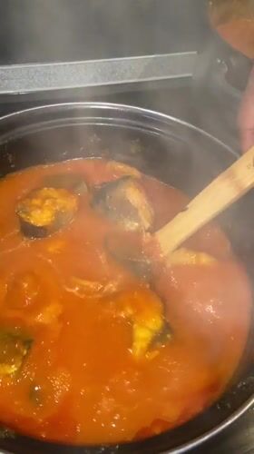 Home cooking session captured in Kazan, fish stew preparation