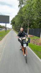 Moscow residents use bikes, unicycles on city pathways