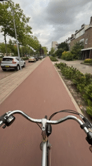 Bike ride along red cycling path in Rijswijk