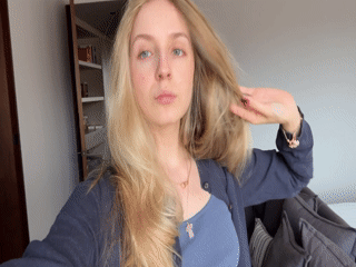 Woman takes selfies at home in Mexico City