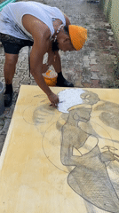 Artist creates large outdoor painting in Ado, Nigeria