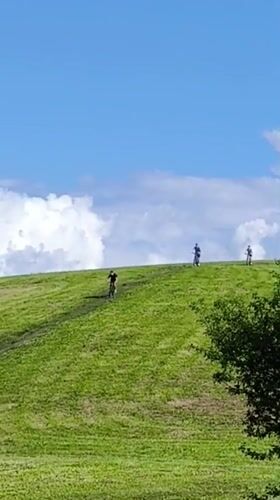 Sunny afternoon on a green hillside in Riga