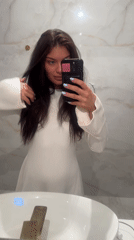 Woman documents evening moments in Moscow apartment
