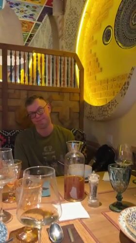 Casual restaurant outing with wine, selfies, and good company