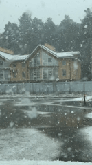 Heavy April snowfall blankets residential Perm, Russia