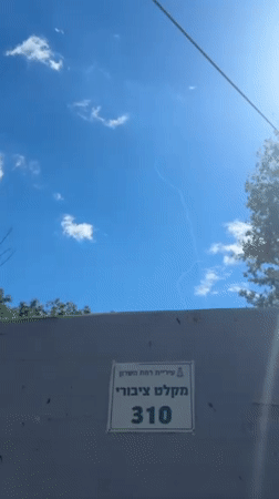 Rocket contrails spotted over Ramat Hasharon as residents gather