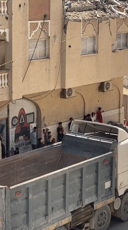 Building damage documented in Khan Yunis street scene