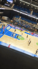 Basketball game documented by witnesses at indoor arena