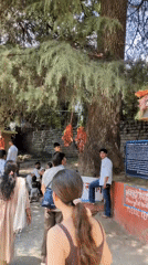 Hadimba Temple grounds, Manali: shrine, fair, and mountain scenery