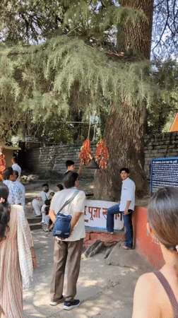 Hadimba Temple grounds, Manali: shrine, fair, and mountain scenery