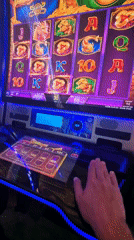 Slot machine gaming and workout content captured simultaneously
