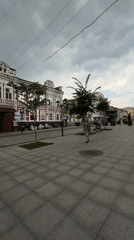 Street-level tour of Saratov's layered architecture on a cloudy morning