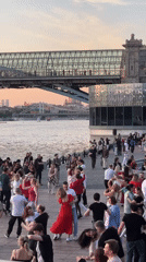 Outdoor dancing observed on Moscow river pier
