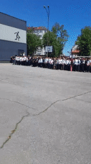 Students gather in formation on sunny day in Burgas