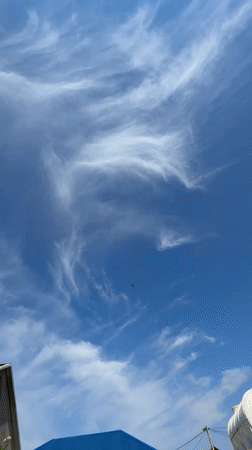 Clear summer skies over Khazar Raion rooftops