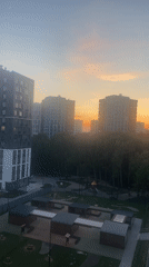 Urban sunset captures colorful sky over apartment buildings