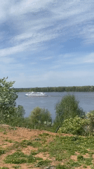 Cruise ship travels scenic Russian river near Ольховка