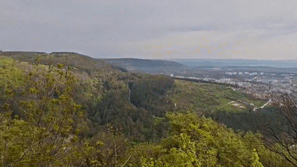 Morning panoramic view captured of Bulgarian cityscape in valley