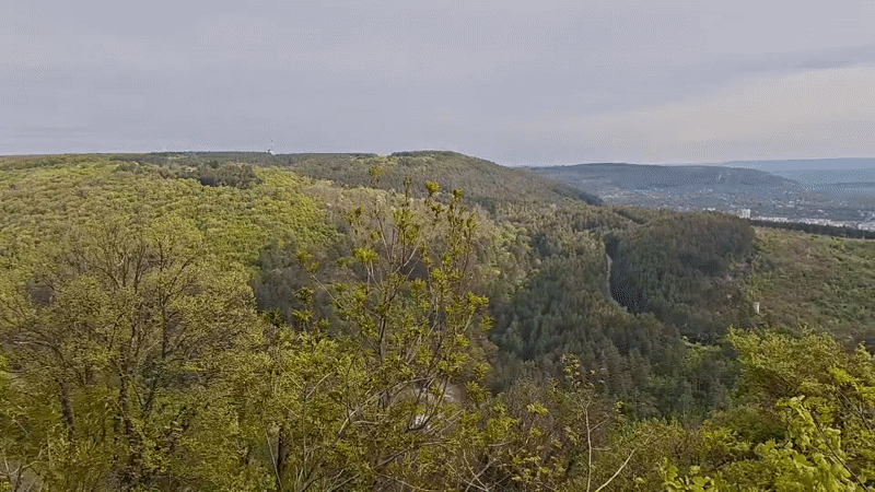 Morning panoramic view captured of Bulgarian cityscape in valley