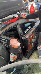 Modified car meet underway in an Irkutsk outdoor lot