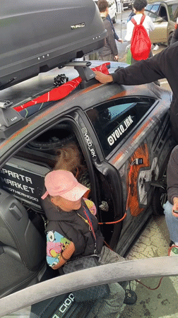 Modified car meet underway in an Irkutsk outdoor lot