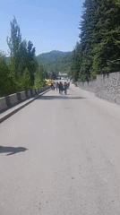Morning pedestrian activity documented on Almaty street