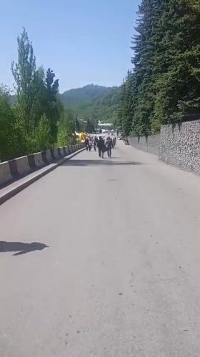Morning pedestrian activity documented on Almaty street