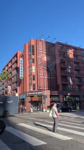 Inside and outside Hollywood's Pantages Theatre on a summer night