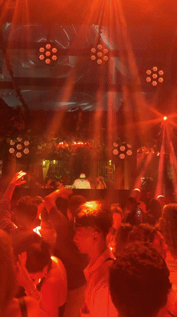 Nightclub event with illuminated cube structure documented in Kuta Selatan