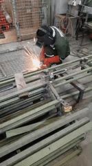 Metal grinding sparks fly in a North Jakarta workshop